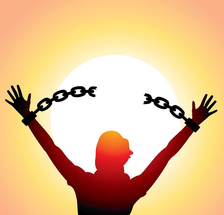 Man breaking chains
